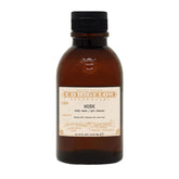 Brown bottle of Co. Bigelow Musk body wash on a white background
