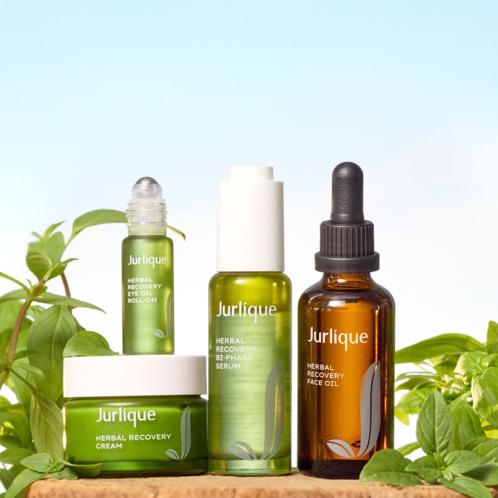 Jurlique Herbal Recovery products including serum, cream, and face oil with a natural background